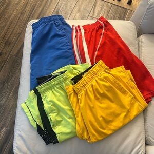 Men’s athletic short bundle. 4 pairs. 3 Under Armour, 1 Nike